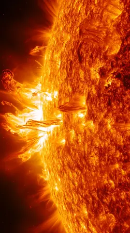 Striking closeup of the turbulent, fiery surface of the Sun, revealing intricate patterns and explosive plasma eruptions.